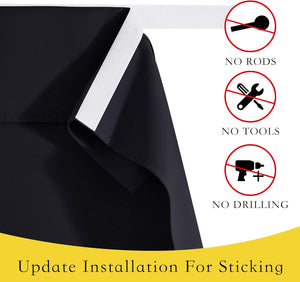 Close-up of black blackout blind with white adhesive strip for easy no-drill installation