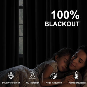 Solid dark blackout curtains completely cover a window, creating a dark, quiet room for comfortable sleep.