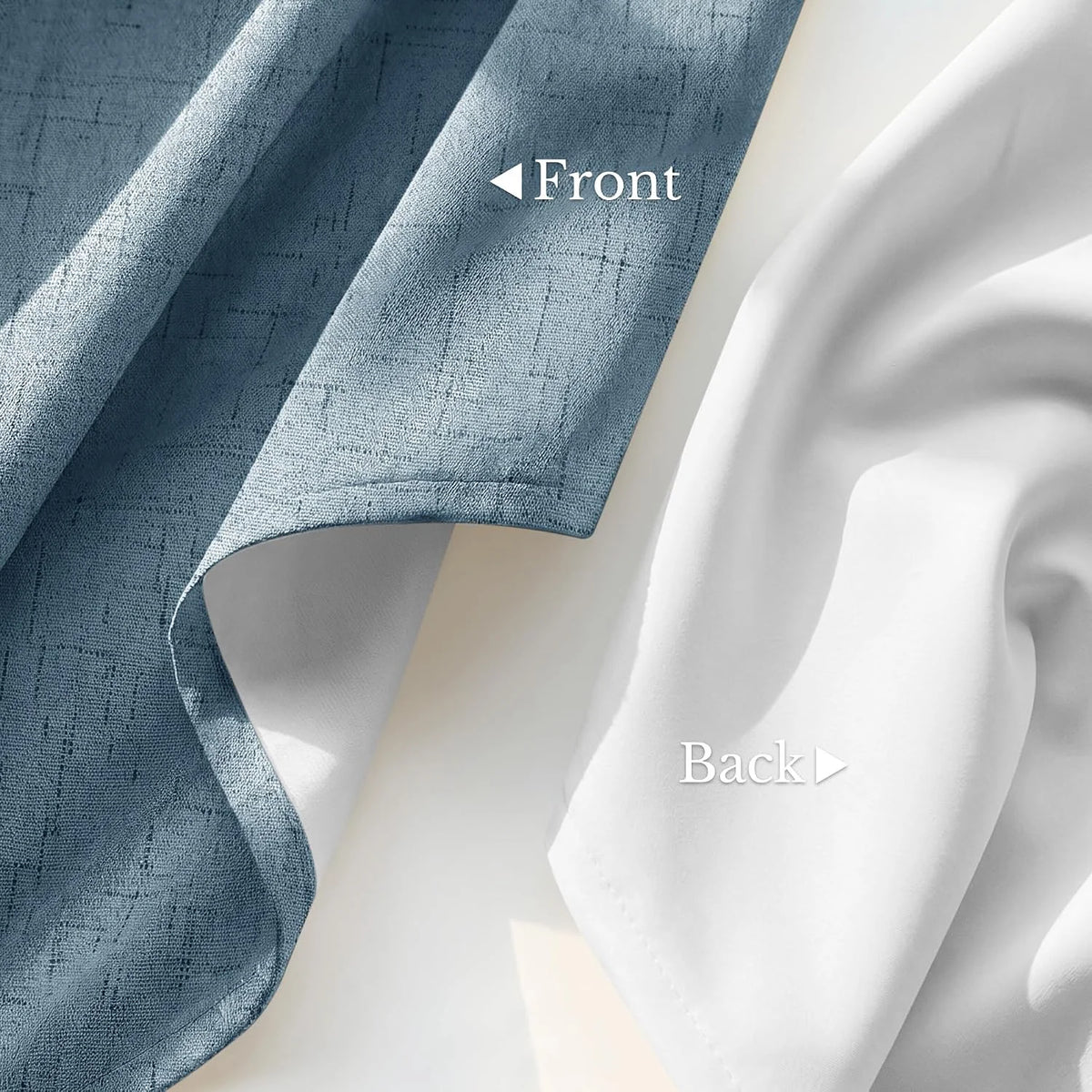 Blue linen-look blackout curtain fabric showing textured front and smooth white back