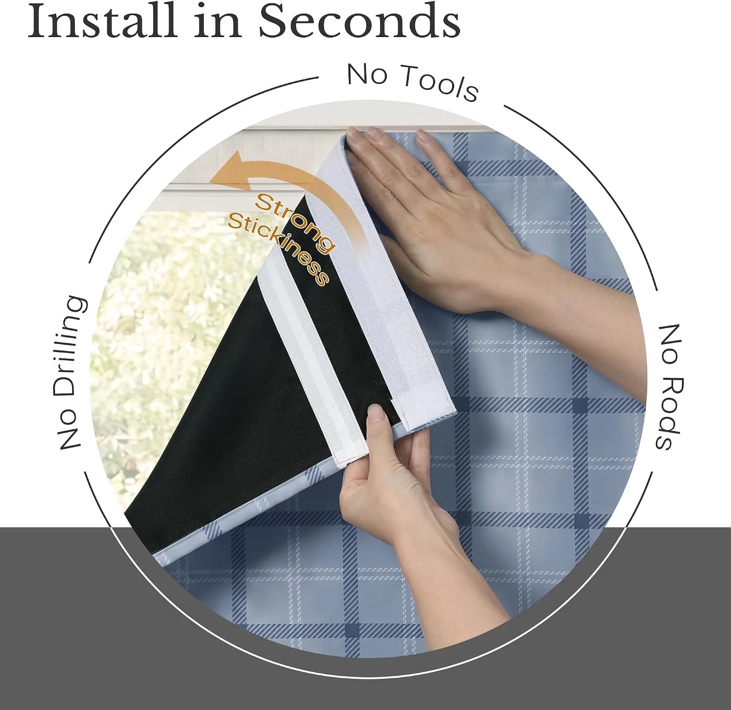 Hands installing a blue plaid adhesive blackout curtain on a window without tools