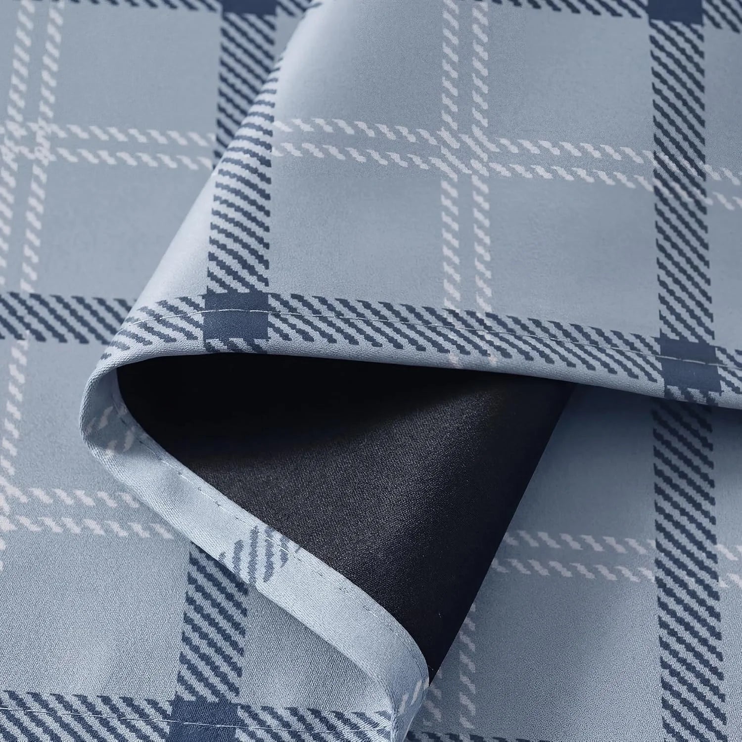 Light blue plaid curtain fabric with soft fleece face and black blackout backing