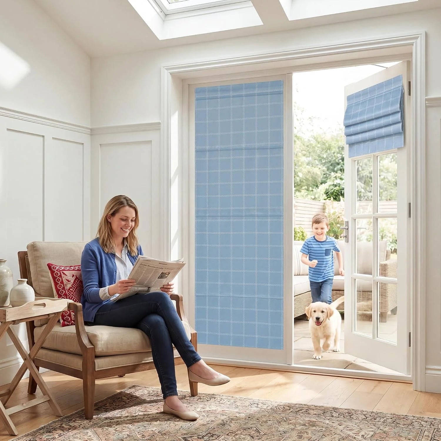 Blue plaid Roman blinds on glazed patio doors in a bright family living room