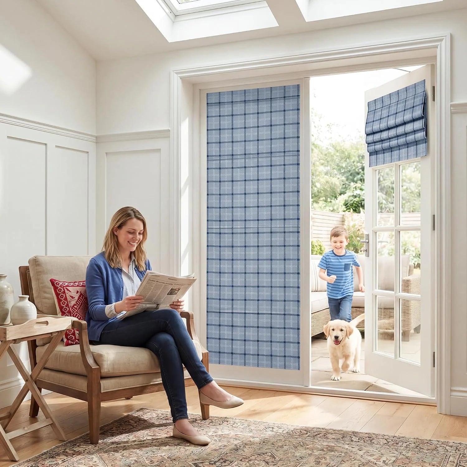 Blue plaid Roman shade covering a glass patio door in a bright family room