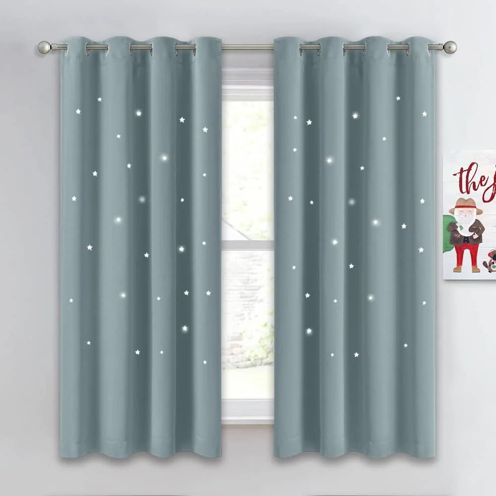 Light blue blackout curtains with glowing star print and silver grommet top