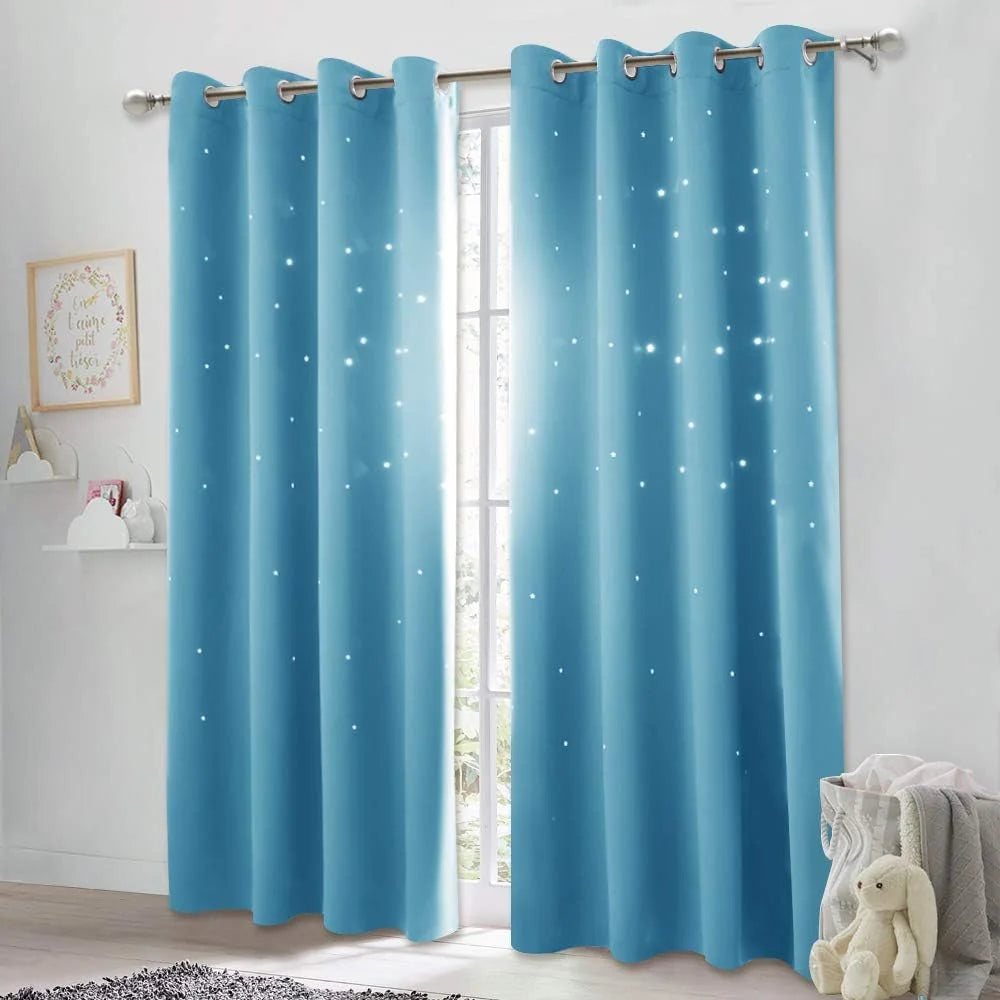 Light blue star cutout blackout curtains with grommet top in a bright kids room