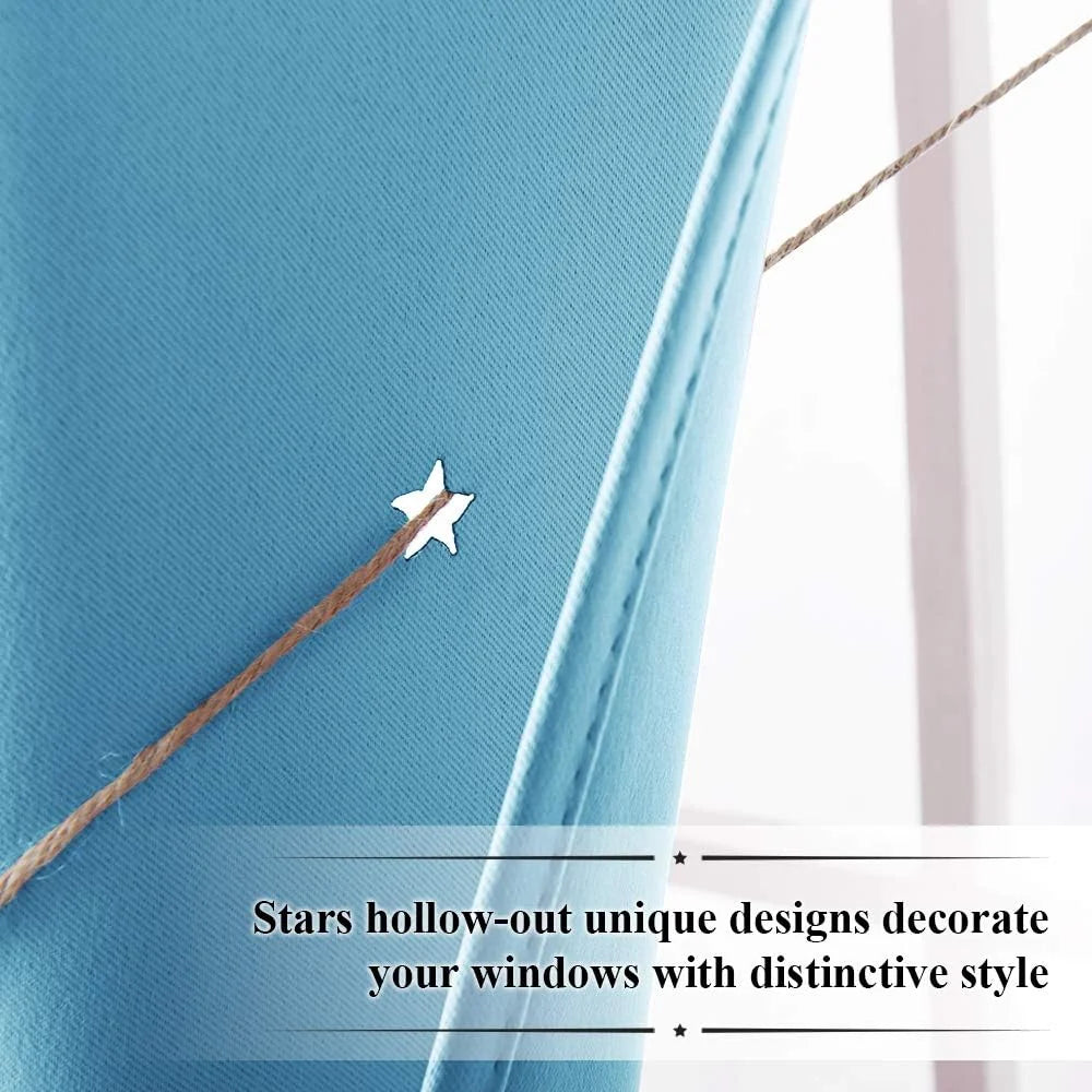 Close-up of a light blue curtain with star cutout detail and rustic rope tieback