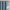 Blue textured grommet curtains on a rod. Silver metal grommet opening measures 1.6 inches.
