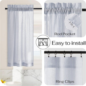 Blue and white striped cafe curtain with rod pocket top, hanging in kitchen window. Compatible with ring clips.