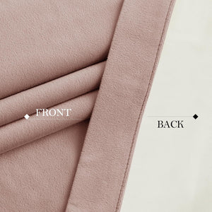 Close-up of blush pink brushed fabric, showing plush front texture and smooth reverse side.
