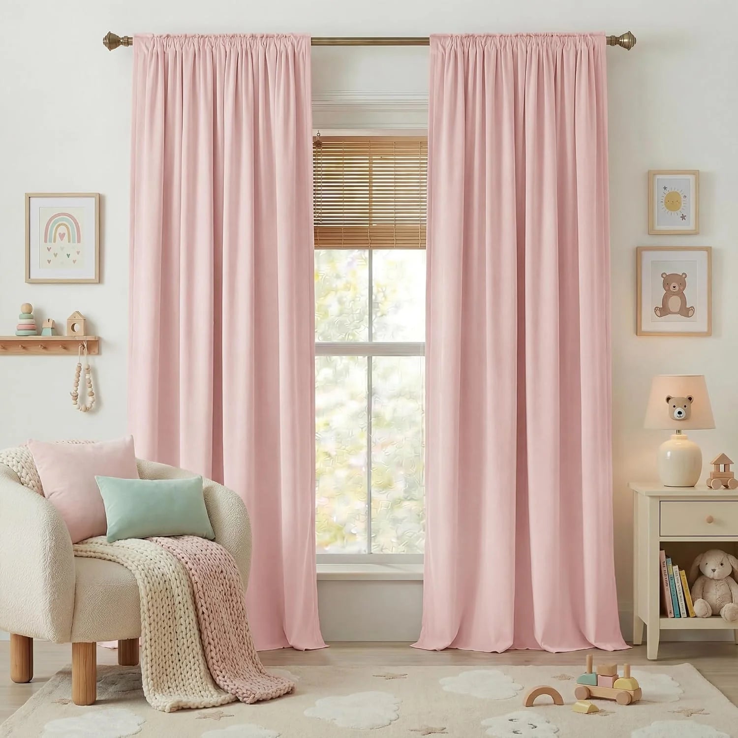 Blush pink rod pocket curtains hanging in a soft, cozy nursery or kids room