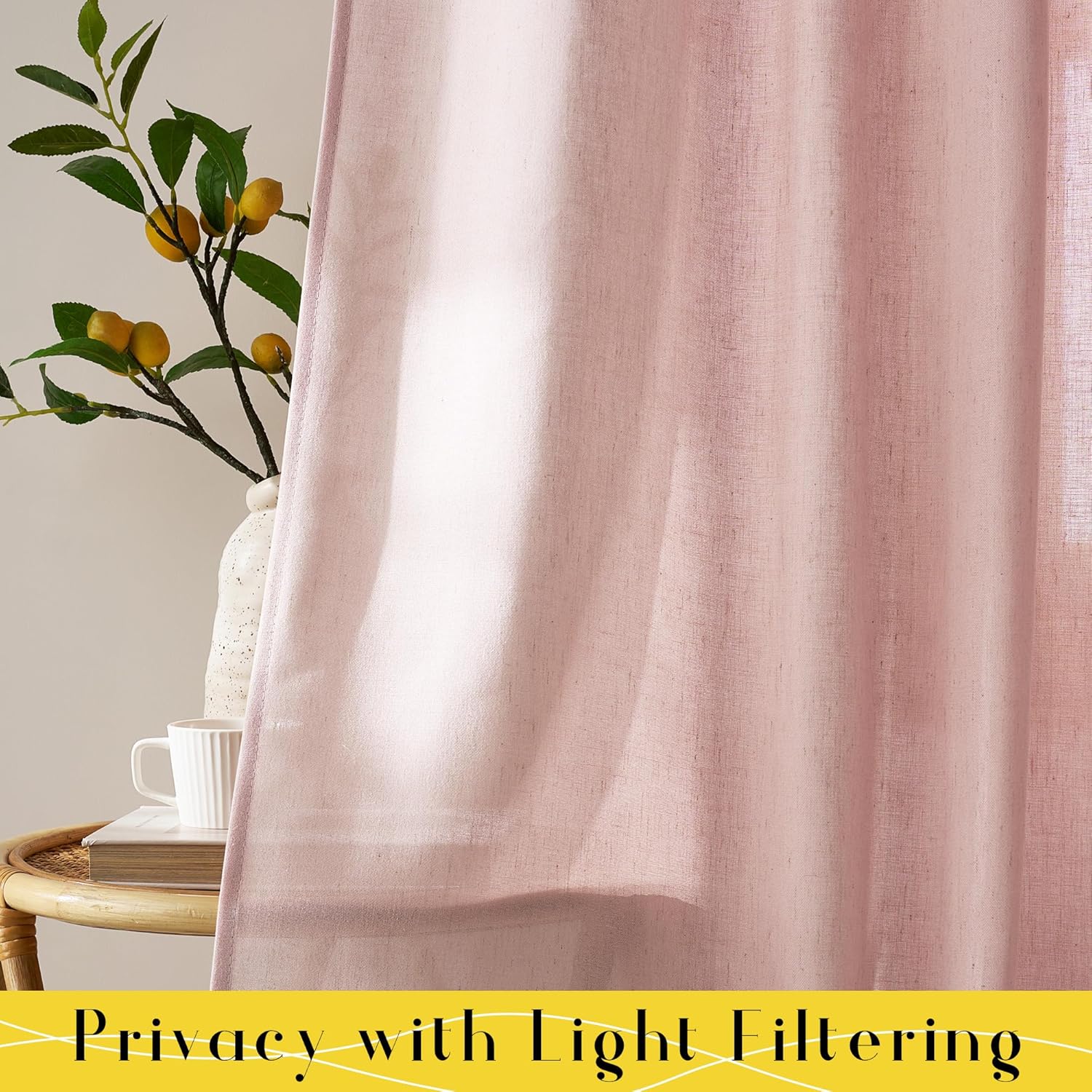 Blush pink light filtering curtain with a rustic linen-like texture, gently diffusing sunlight.
