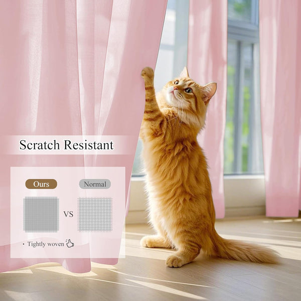 Orange cat playfully claws blush pink sheer curtains, demonstrating their tightly woven, scratch-resistant fabric.