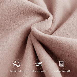 Close-up of blush pink smooth velvet fabric, appearing soft, durable, and machine washable.