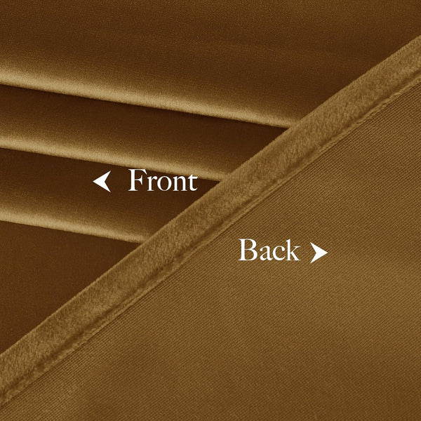 Close-up of bronze velvet fabric, showing soft, folded front and a tightly woven blackout back.