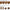 Warm brown curtain fabric swatch showing color variations under warm, cool, bright, and low light.