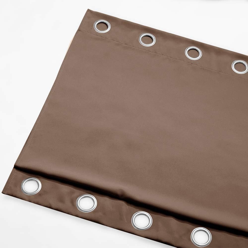 Close up of a solid brown curtain panel with silver metal grommets along the top for easy hanging.