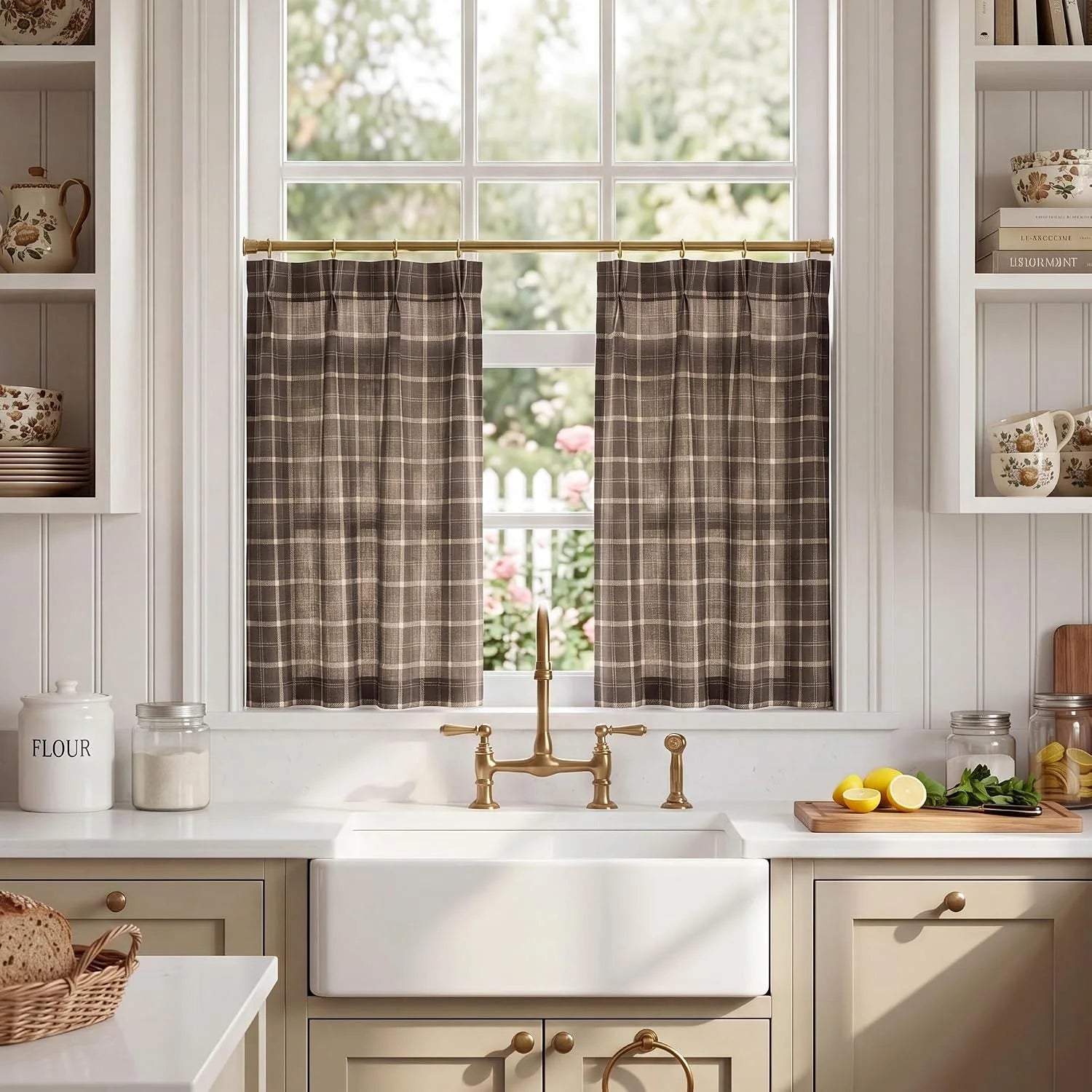 Brown plaid cafe curtains on a brass rod above a farmhouse kitchen sink