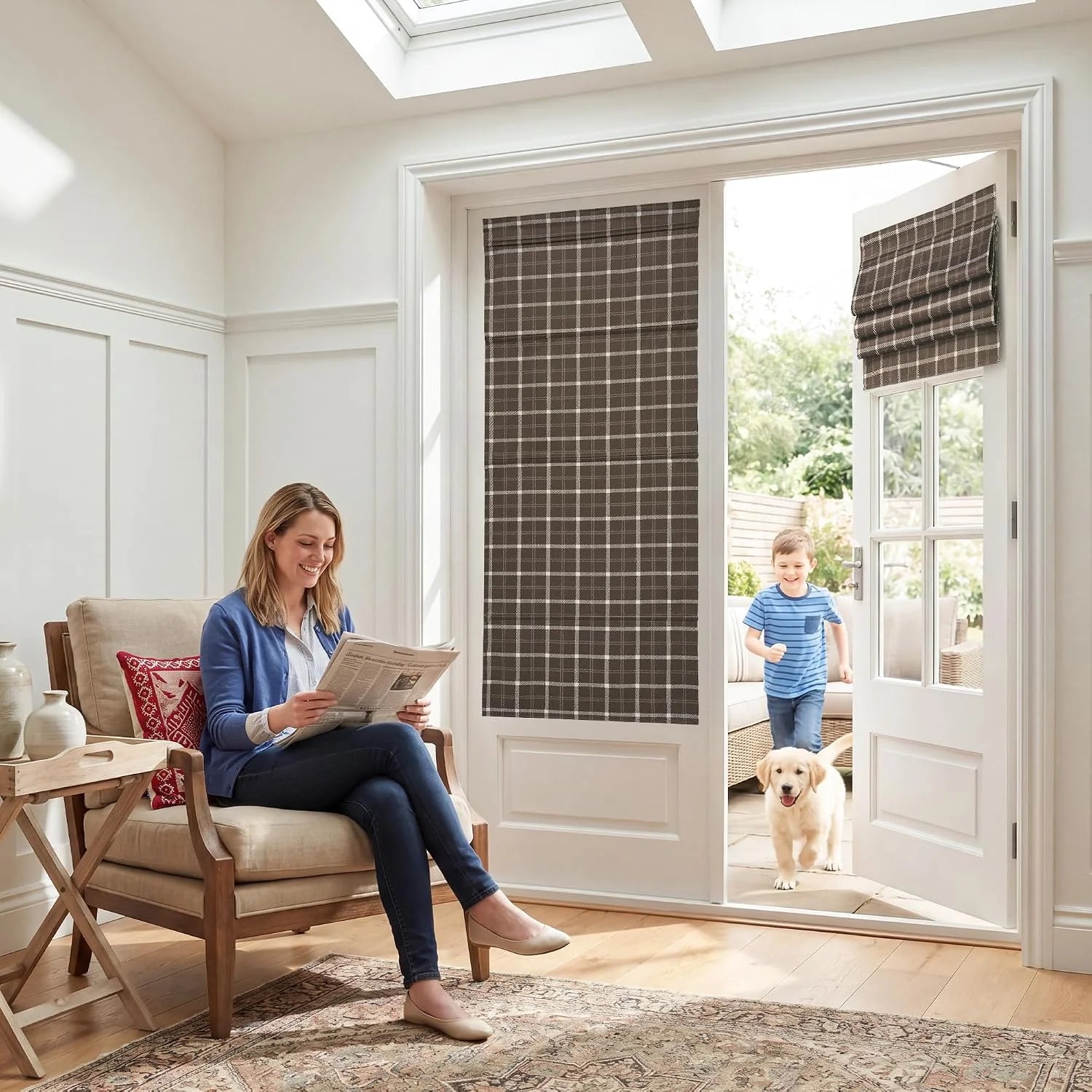 Brown plaid Roman shades on French doors in a bright modern sitting room