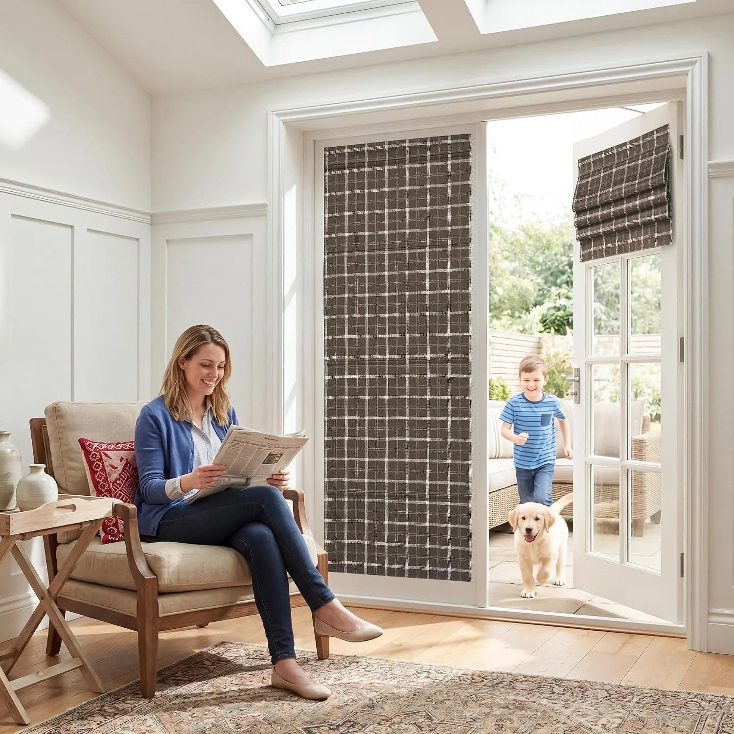 Brown plaid Roman shade on a glass patio door in a bright modern living room