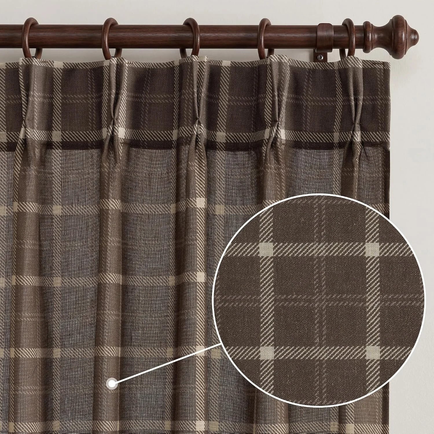 Brown plaid tab top curtain panel on a dark wooden rod with textured weave detail