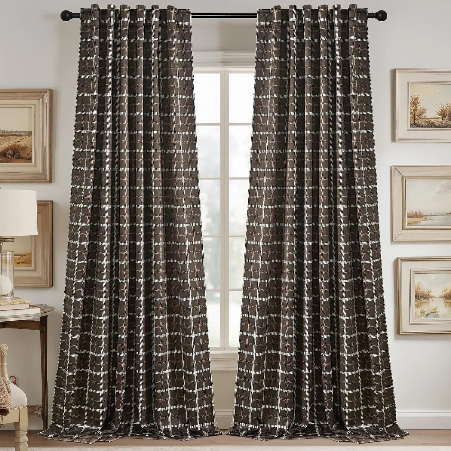 Brown plaid curtain panels hanging on a black rod in a cozy traditional room