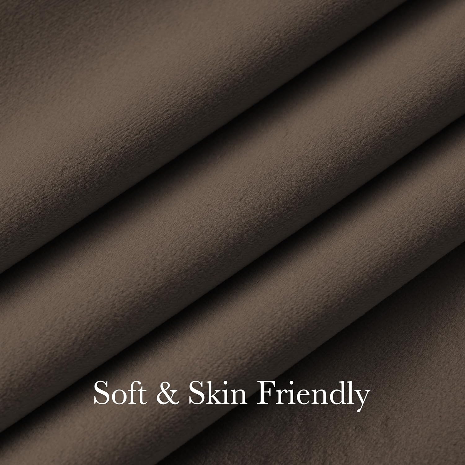 Detailed view of a rich brown, soft, and skin-friendly textile fabric, draped with gentle folds.