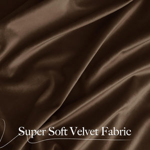 Close-up of draped brown super soft velvet fabric showing its luxurious texture and subtle sheen.