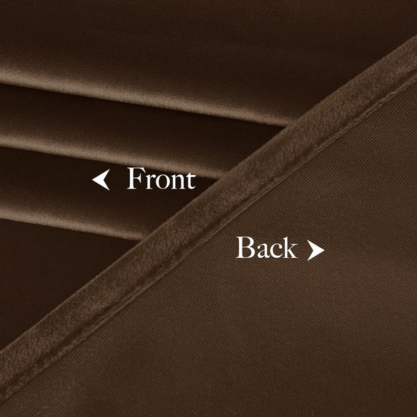 Close-up of brown blackout curtain fabric, showing its soft velvet front and tightly woven back.