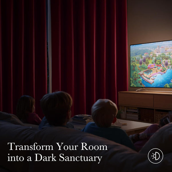 Rich burgundy blackout curtains drawn to darken a room for children watching TV.