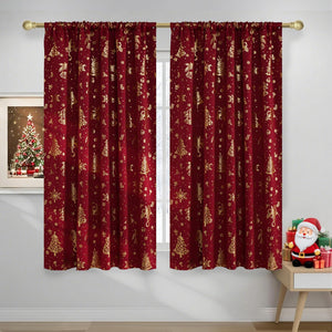 Burgundy curtains with metallic gold Christmas trees, snowflakes, and bells, hung on a gold rod.