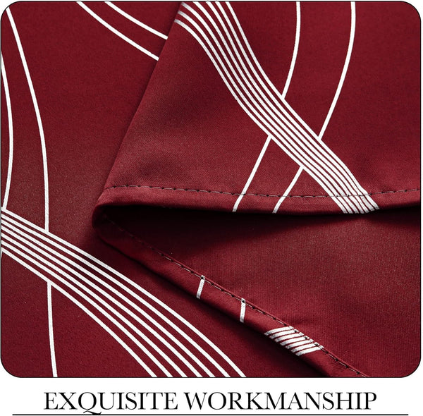 Close-up of rich burgundy fabric featuring a white abstract geometric line pattern and visible, neat stitching.