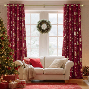 Festive burgundy curtains with shimmering gold foil Christmas tree, snowflake, and bell patterns. Grommet top design.