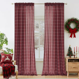 Deep burgundy textured curtains featuring a subtle white plaid pattern and a gathered rod pocket top.