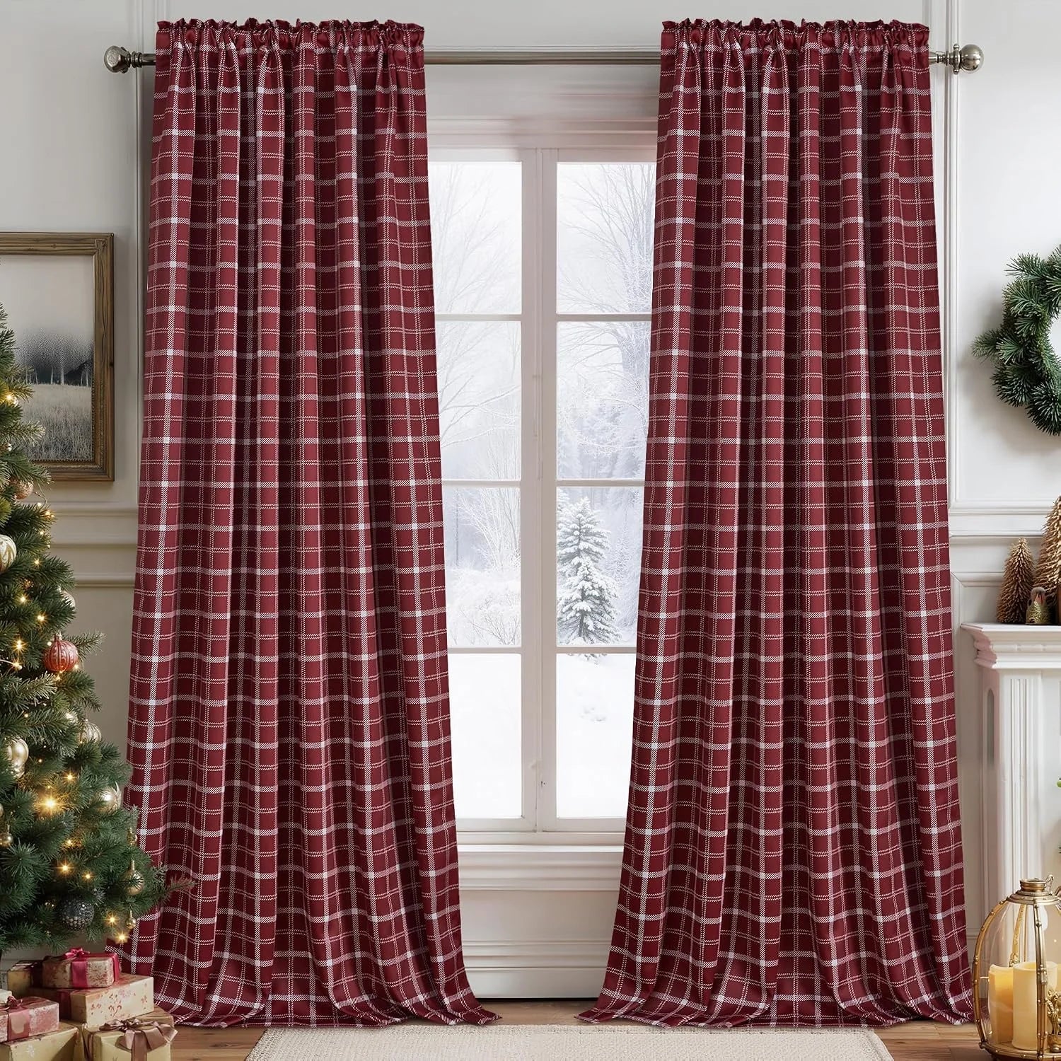 Burgundy plaid curtains hanging on a window in a cozy holiday-decorated living room