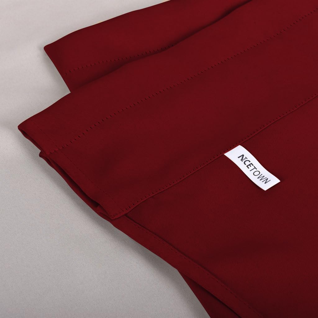 Rich burgundy red thermal insulated curtain panel showing smooth fabric, visible top stitching, and NICETOWN brand label.