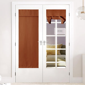 Burnt orange fabric privacy panel and decorative tie-up shade on white French doors.