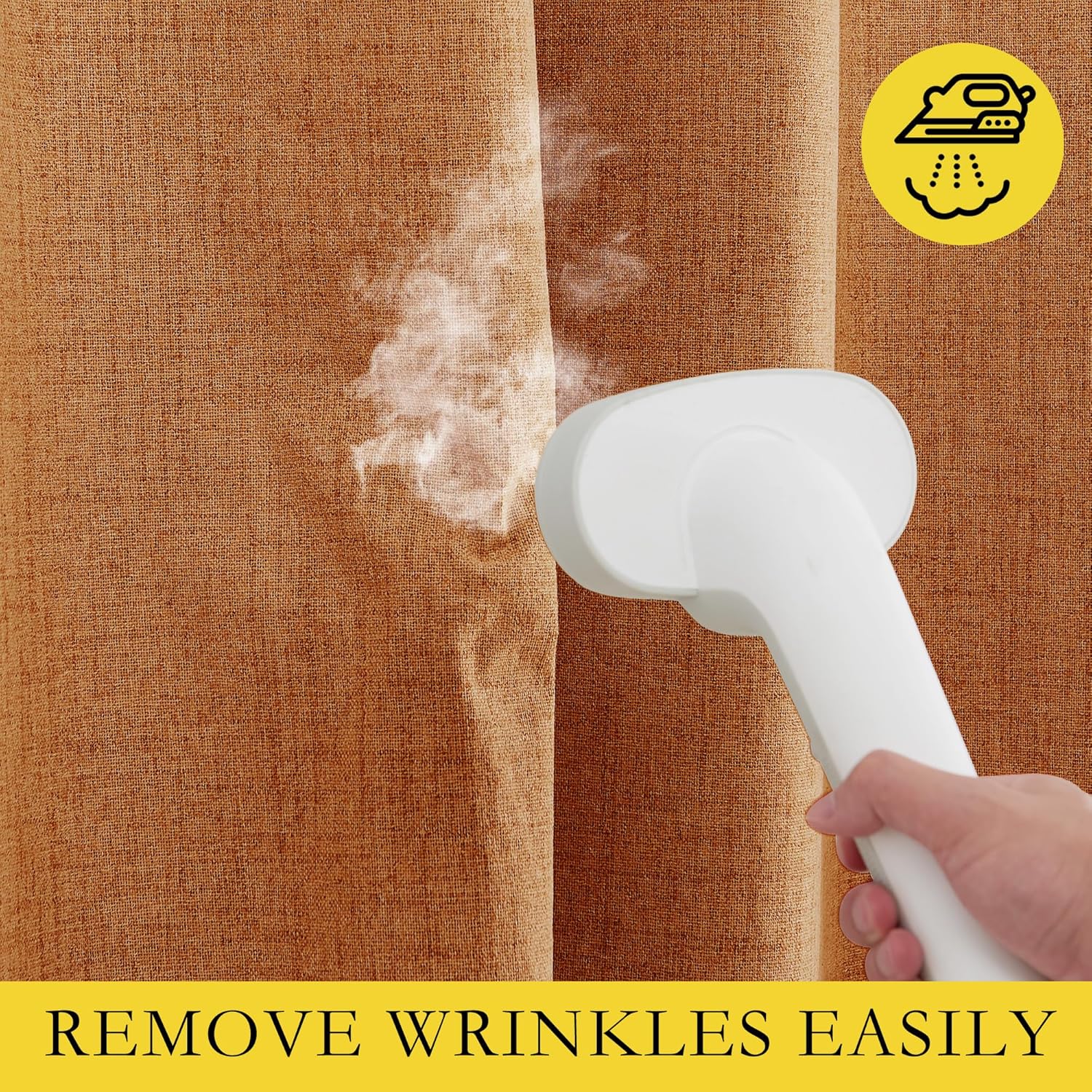 A hand holds a white steamer, removing wrinkles from a burnt orange, textured linen curtain.