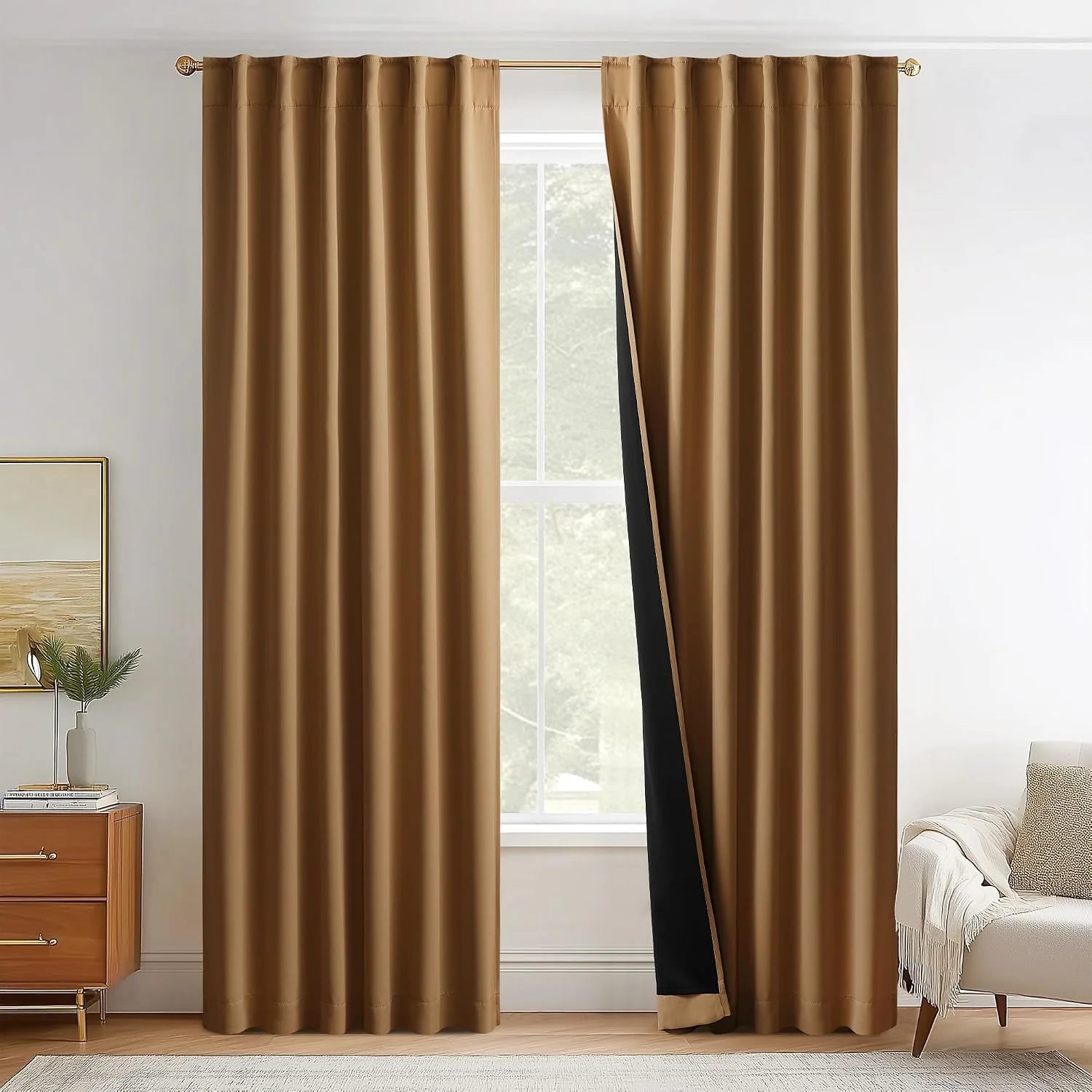 Camel brown blackout curtains on a gold rod in a bright modern living room