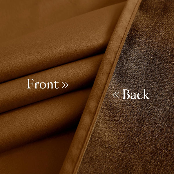 Smooth camel brown fabric front and dark textured blackout material on the reverse side.