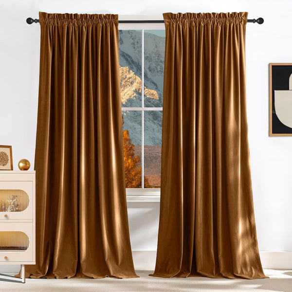 Pair of caramel brown velvet curtains with gathered rod pocket top, pooling on floor.