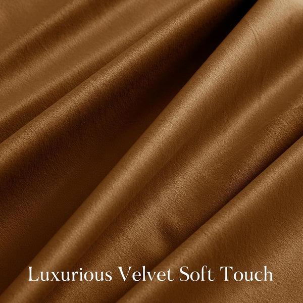 Close-up of luxurious caramel brown velvet fabric, highlighting its soft pile texture and elegant folds.