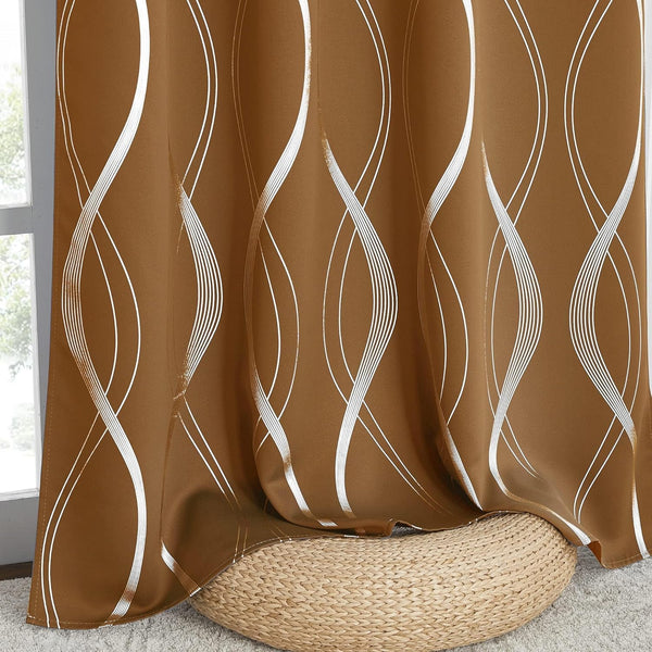 Modern caramel brown curtain panel with white wavy abstract lines, draped over a woven pouf.