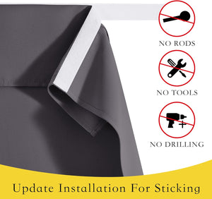 Dark grey blackout curtain with white adhesive velcro for easy, no-drill stick-on installation.