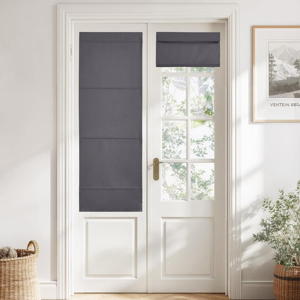 Two charcoal fabric roman shades on a white French door, one extended for privacy, the other folded at the top.