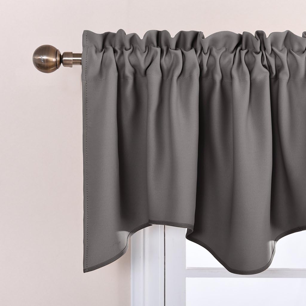 Charcoal gray window valance with a ruffled rod pocket top and decorative scalloped hem, on bronze rod.
