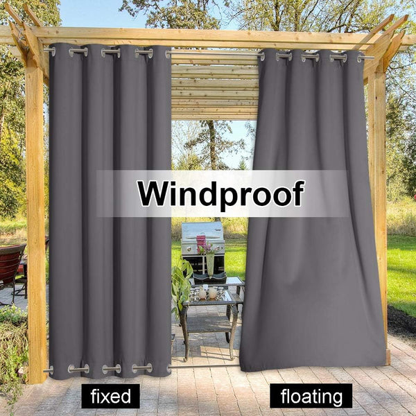 Charcoal gray windproof outdoor curtains with grommet tops on a pergola, showing fixed and floating styles.