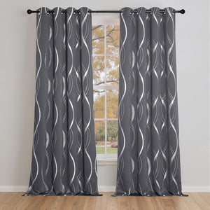 Modern charcoal gray window drapes with shimmering silver metallic wave pattern and grommet top.