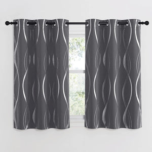 Pair of dark gray curtains with metallic silver wavy lines, featuring grommet tops, hanging on a black rod.