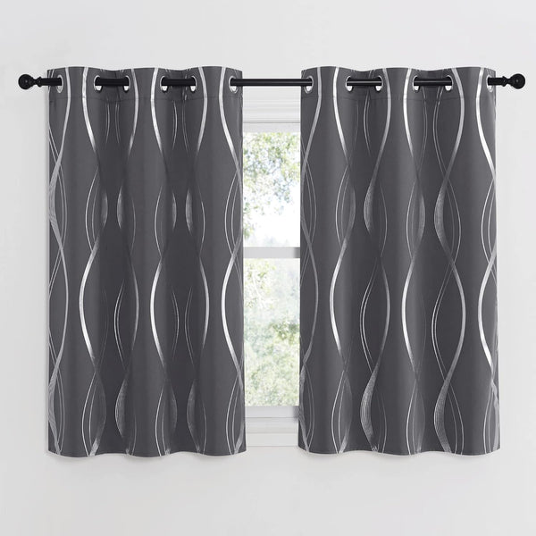Pair of dark gray curtains with metallic silver wavy lines, featuring grommet tops, hanging on a black rod.