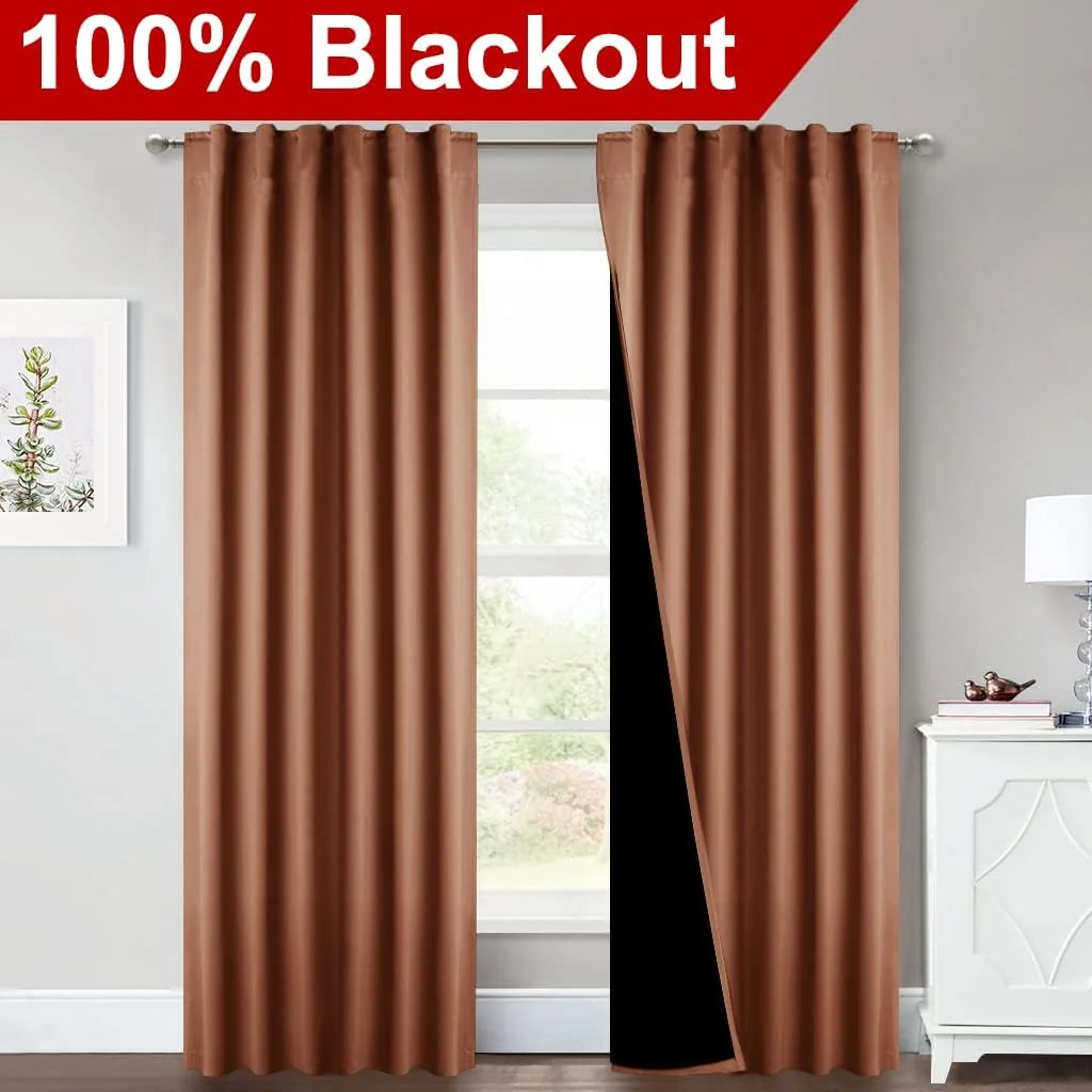 Copper brown blackout curtain panels on a silver rod in a bright modern room